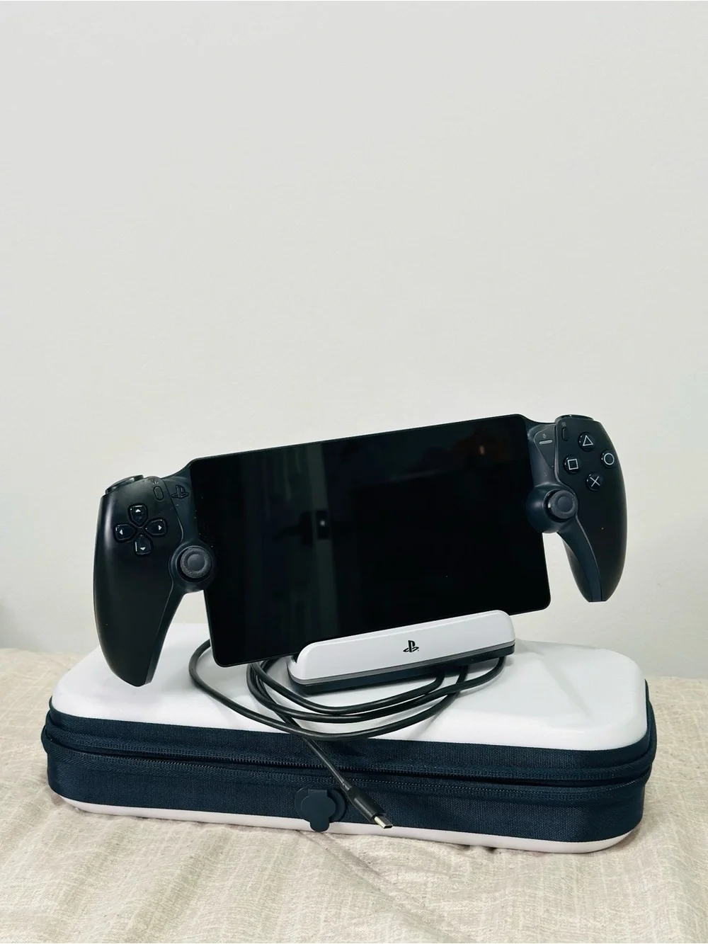 Sony Black Handheld Gaming Controller with Blue Accents